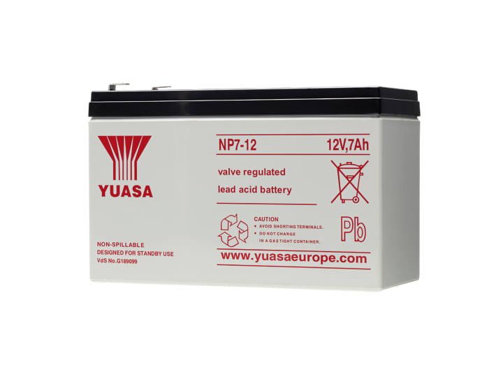 Yuasa NP7-12 fire alarm sensor with system-sensor-ulc-znac-ps-jem branding, mounted on a wall with visible wiring and mounting details.