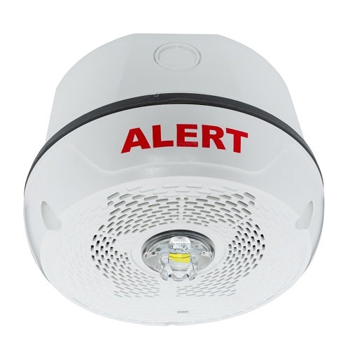 System Sensor SPSCWKLED-CLR-ALRT fire alarm with LED indicator and clear cover, mounted on wall in a typical setting.