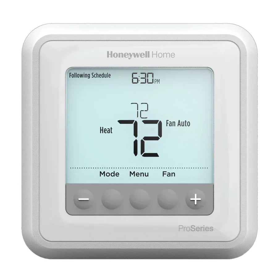 Resideo TH6210U2001/U fire alarm sensor with ULC certification, mounted on a wall in a residential or commercial setting.