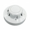 APC 55000-335DCT fire alarm by Air Products and Controls, mounted on wall, with visible alarm sensor and wiring.