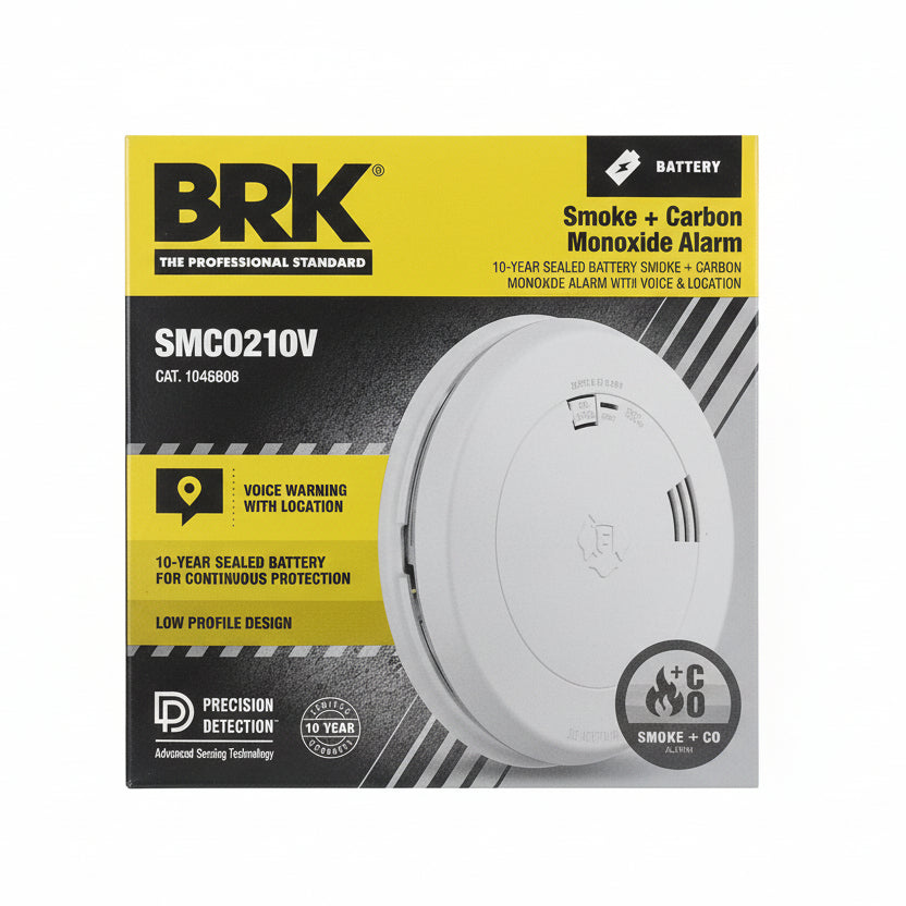 BRK SMCO210V Smoke and CO alarm with voice alerts, mounted on ceiling, featuring digital display and test button.
