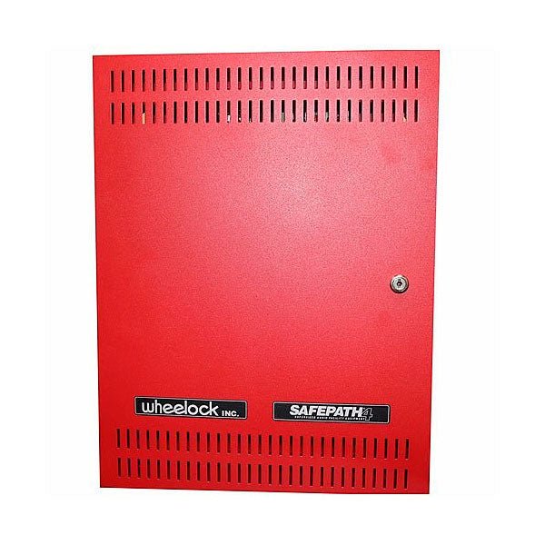 Eaton Wheelock SPB-160 audio unit mounted on a wall, featuring control buttons and connection ports for audio signaling systems.