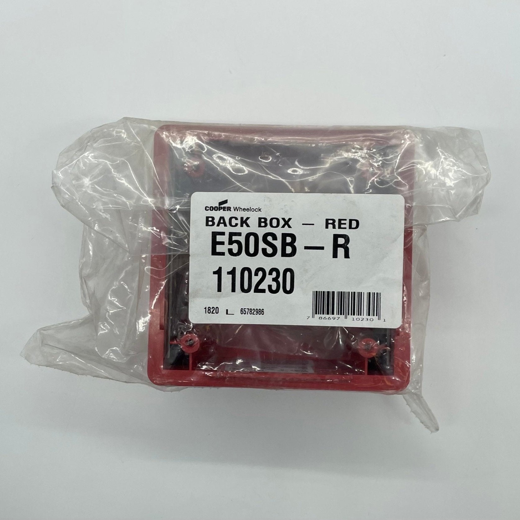 Eaton Wheelock E50SB-R backbox for fire alarm systems, shown in a close-up image with mounting details and product branding.