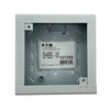 Eaton Wheelock SHBB-W backbox mounted on wall, metal electrical enclosure for wiring and device installations.