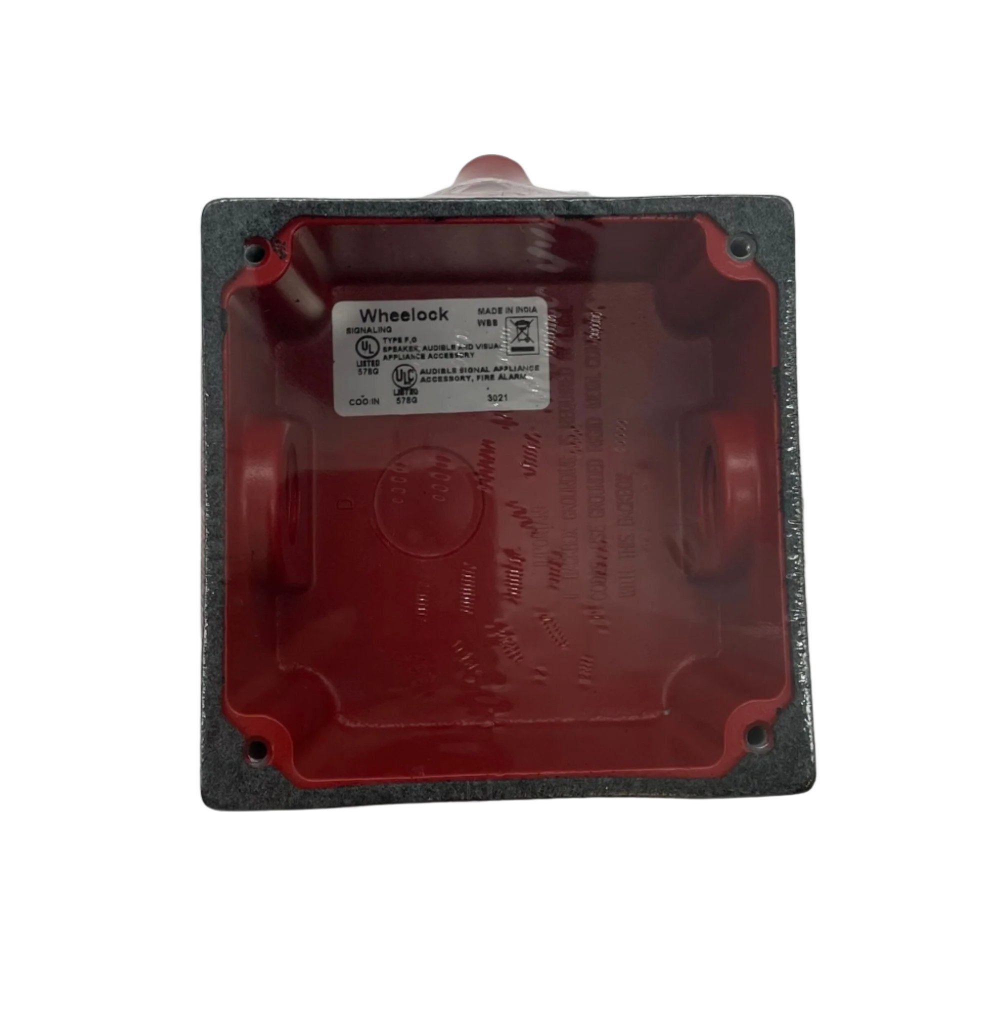 Eaton Wheelock WBB-R-1/2T-1/2B backbox showing metal enclosure with mounting holes for electrical wiring and device installation.