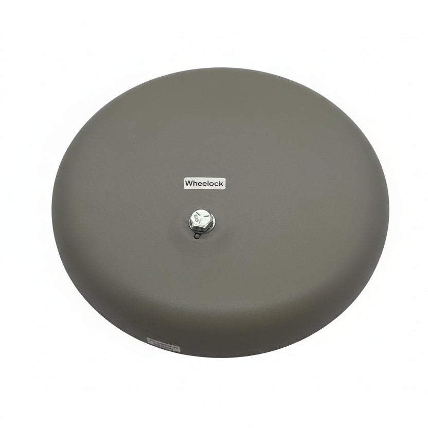Eaton Wheelock 43T-G10-115-S bell with metal construction and mounting bracket, used for industrial signaling.