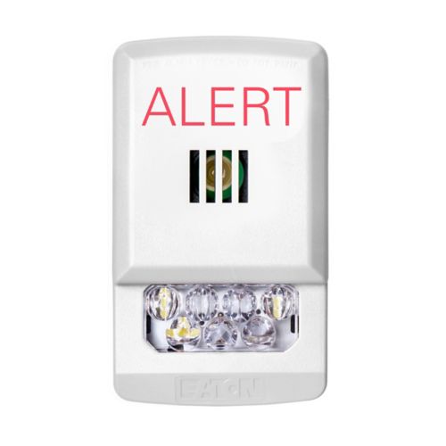 Eaton Wheelock fire alarm system sensor with UL listing, mounted on wall for fire detection and safety monitoring.
