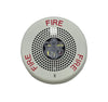 Eaton Wheelock ELFHSWC LED emergency lighting fixture with metal enclosure mounted on a wall in a building.