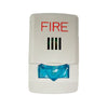 Eaton Wheelock LHSW horn strobe alarm device with yellow housing and mounting hardware on a white background.