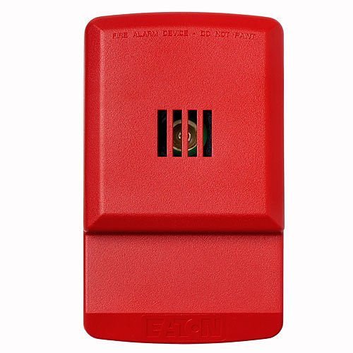 Eaton Wheelock ELHNR fire alarm system sensor mounted on a wall, part of Eaton Wheelock fire alarm safety equipment.