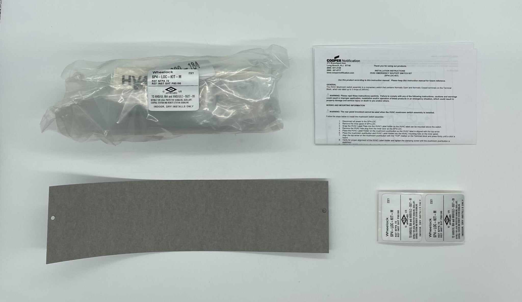 Eaton Wheelock SP4-LOC-KIT-M HVAC security lock kit with metal components and installation hardware, used for safety and security.