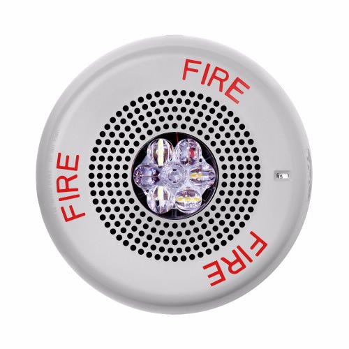 Eaton Wheelock ELSPSTWC speaker strobe light with white housing and mounting base, designed for emergency notification systems.