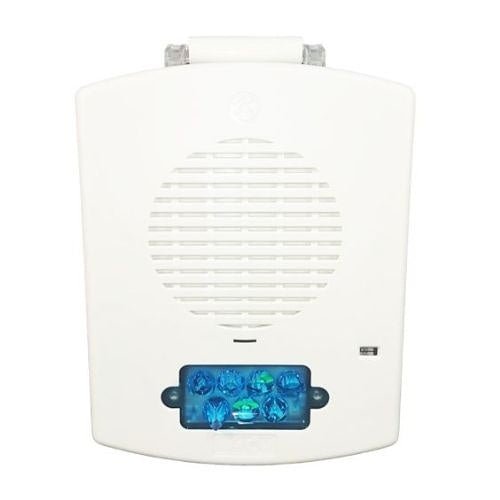 Eaton Wheelock EL4XMTSTB-NW emergency lighting fixture with black finish, mounted on a wall in a commercial setting.