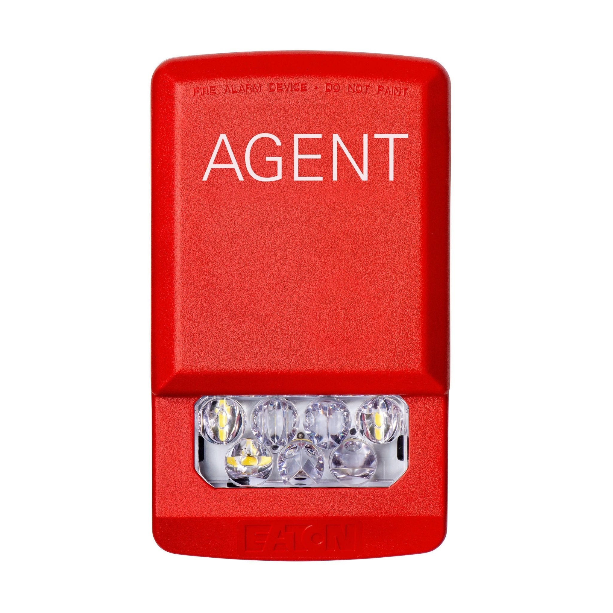 Eaton Wheelock ELSTR-A fire alarm strobe light mounted on wall, white with clear lens, for emergency notification systems.