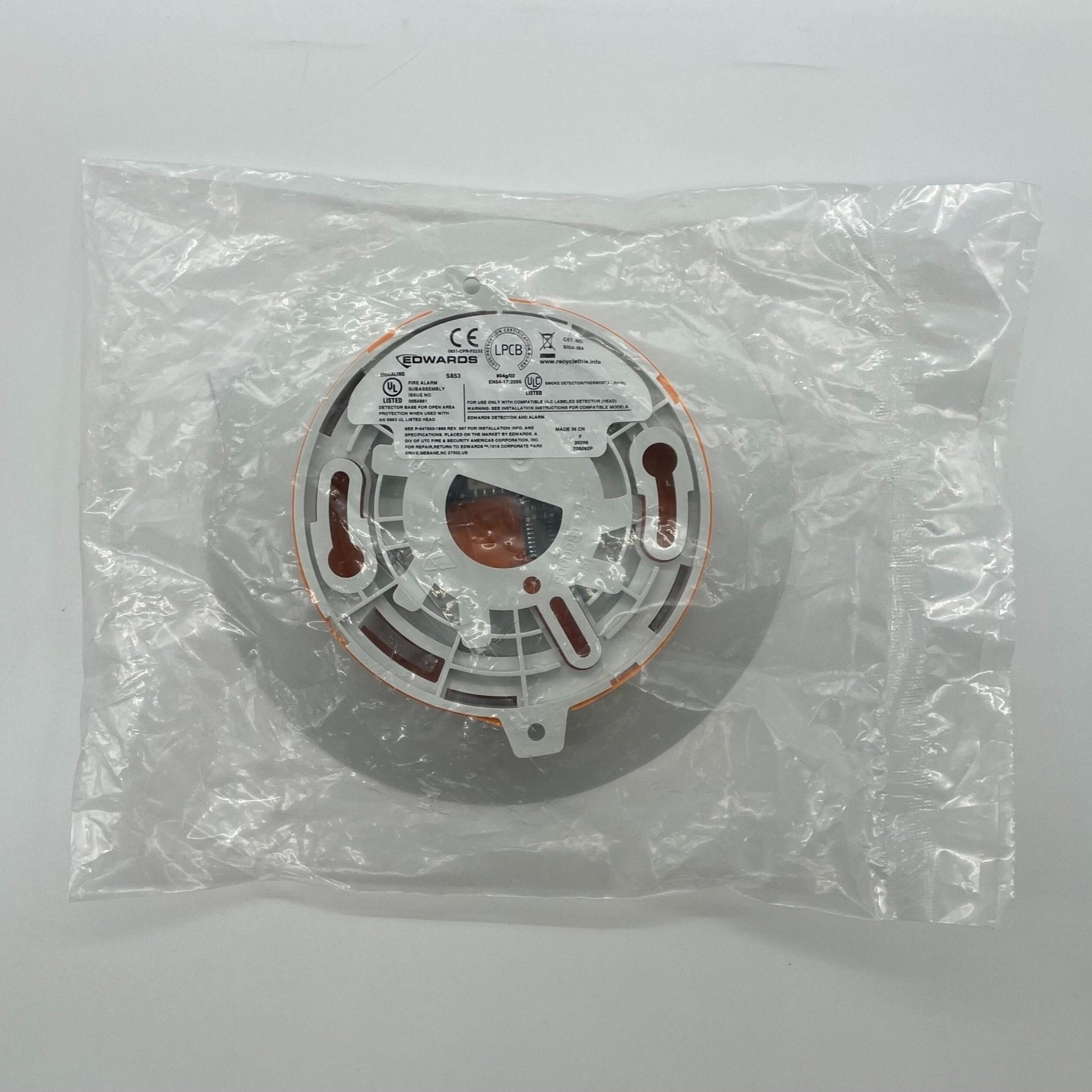 Edwards SIGA-IB4 base for gas detection systems, shown with connected components, in a professional industrial setting.