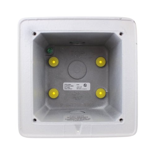 Edwards 757A-WBW fire alarm with white wiring base, mounted on a ceiling, in a commercial building setting