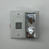 Edwards 7005-G5 fire alarm with detector and wiring, mounted on a wall as part of a building safety system.