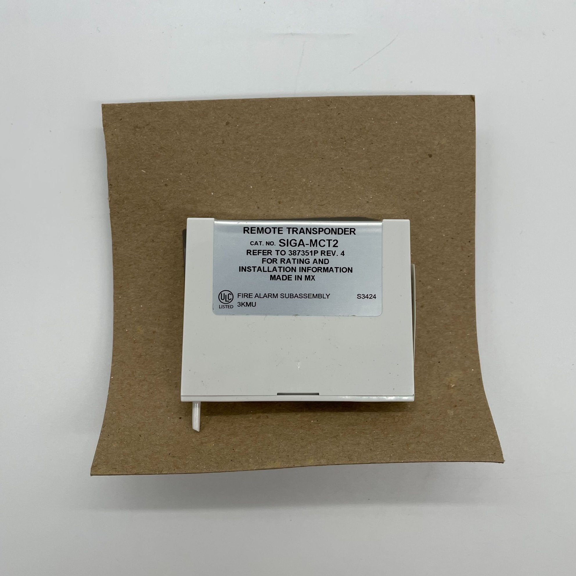 Edwards SIGA-MCT2 module from Jem Systems Canada, showing the compact, rectangular industrial control module with branding.