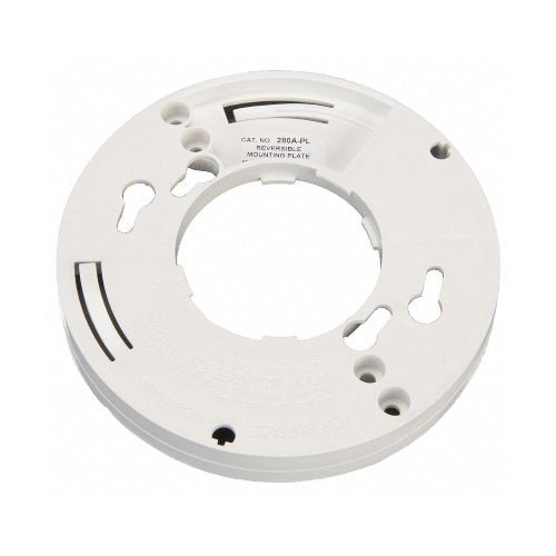 Edwards 280A-PL heat detector mounted on ceiling, black plastic housing with wiring connections, used for fire safety.