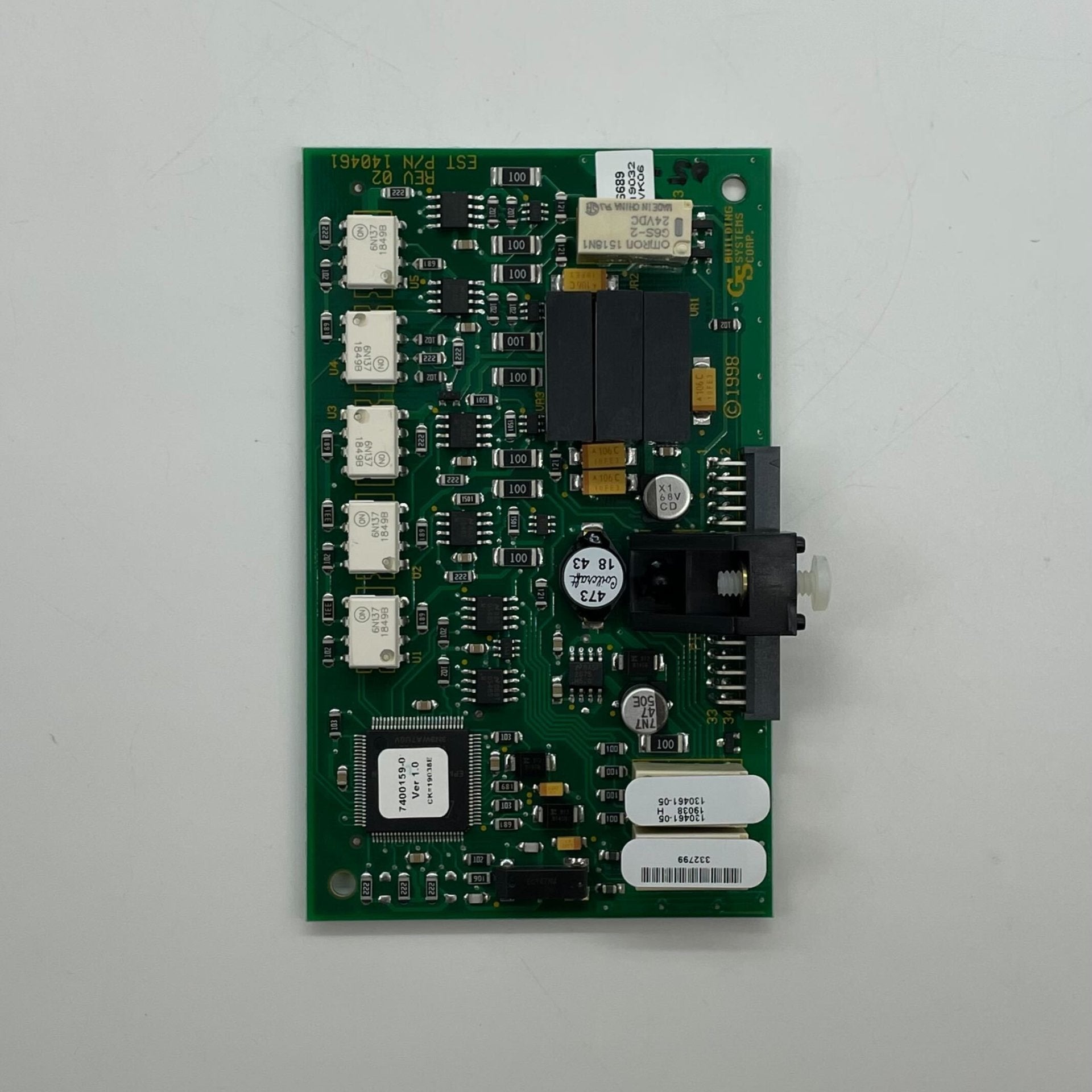 Edwards 3X-NET8 network card with multiple ports, black circuit board, and metal connectors for computer networking.