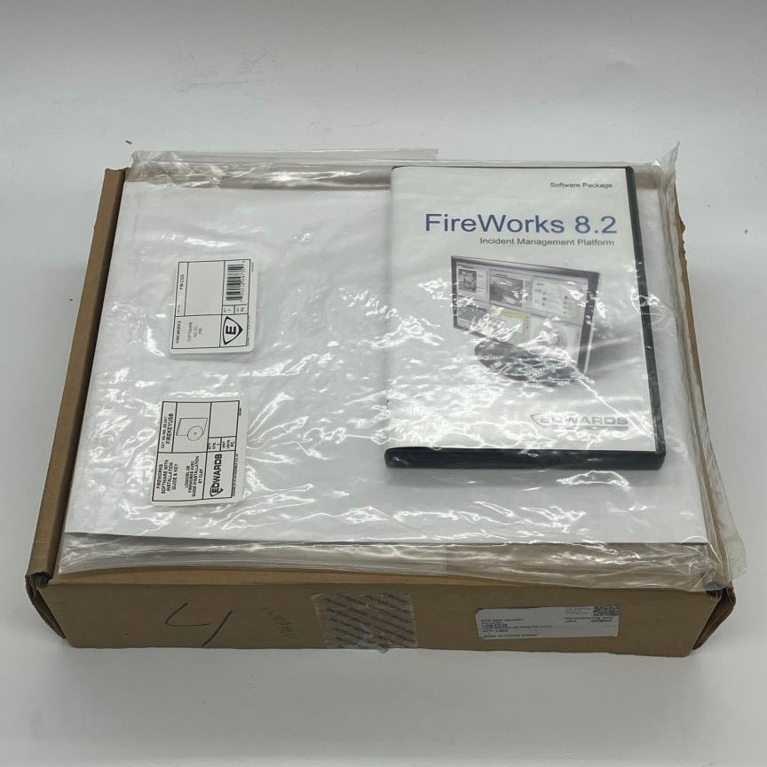 Edwards FW-CGS fire alarm with digital display and sensor, mounted on a wall in a safety setting.
