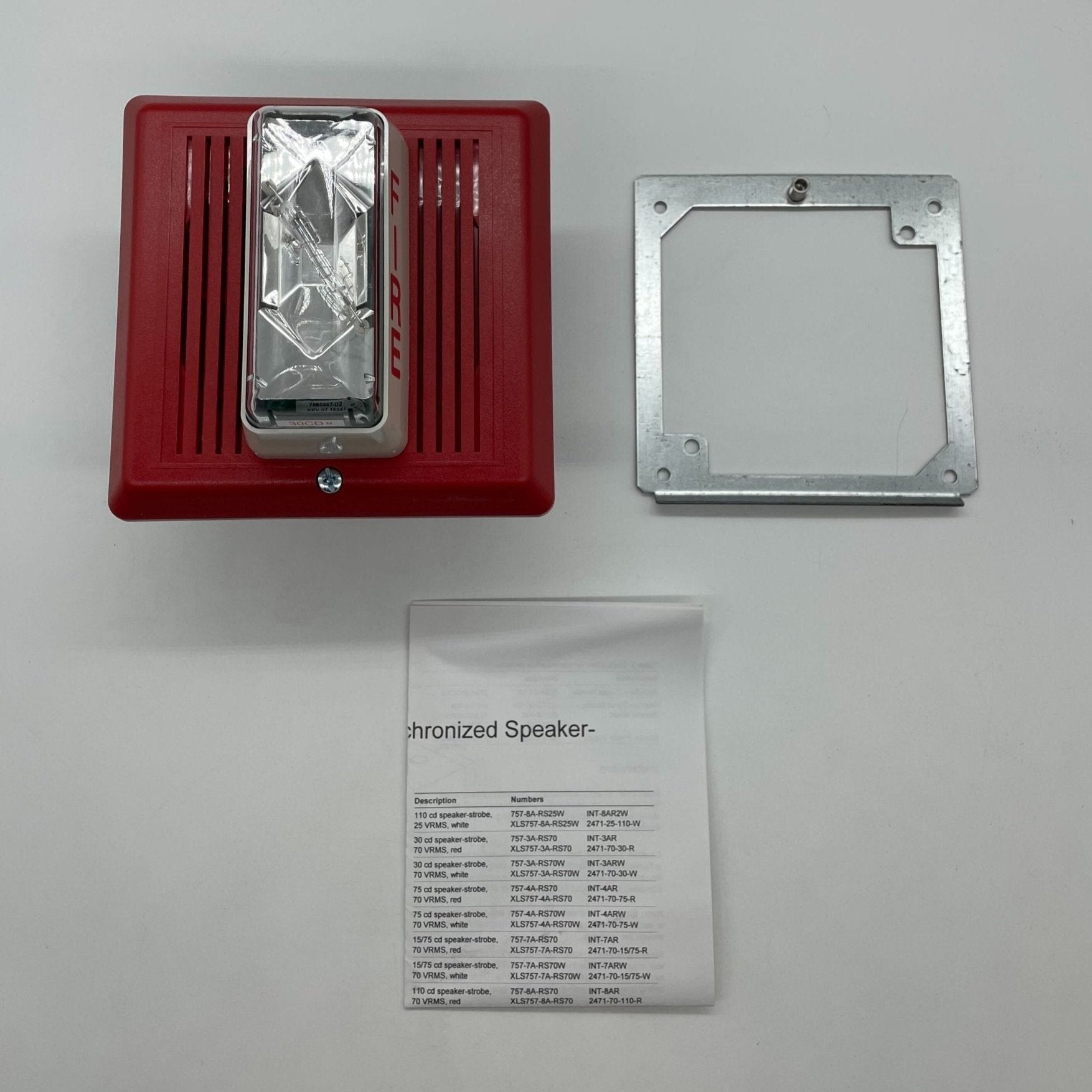 Edwards 757-3A-RS70 speaker strobe light mounted on wall, featuring bright flashing alert for fire safety and emergency signaling