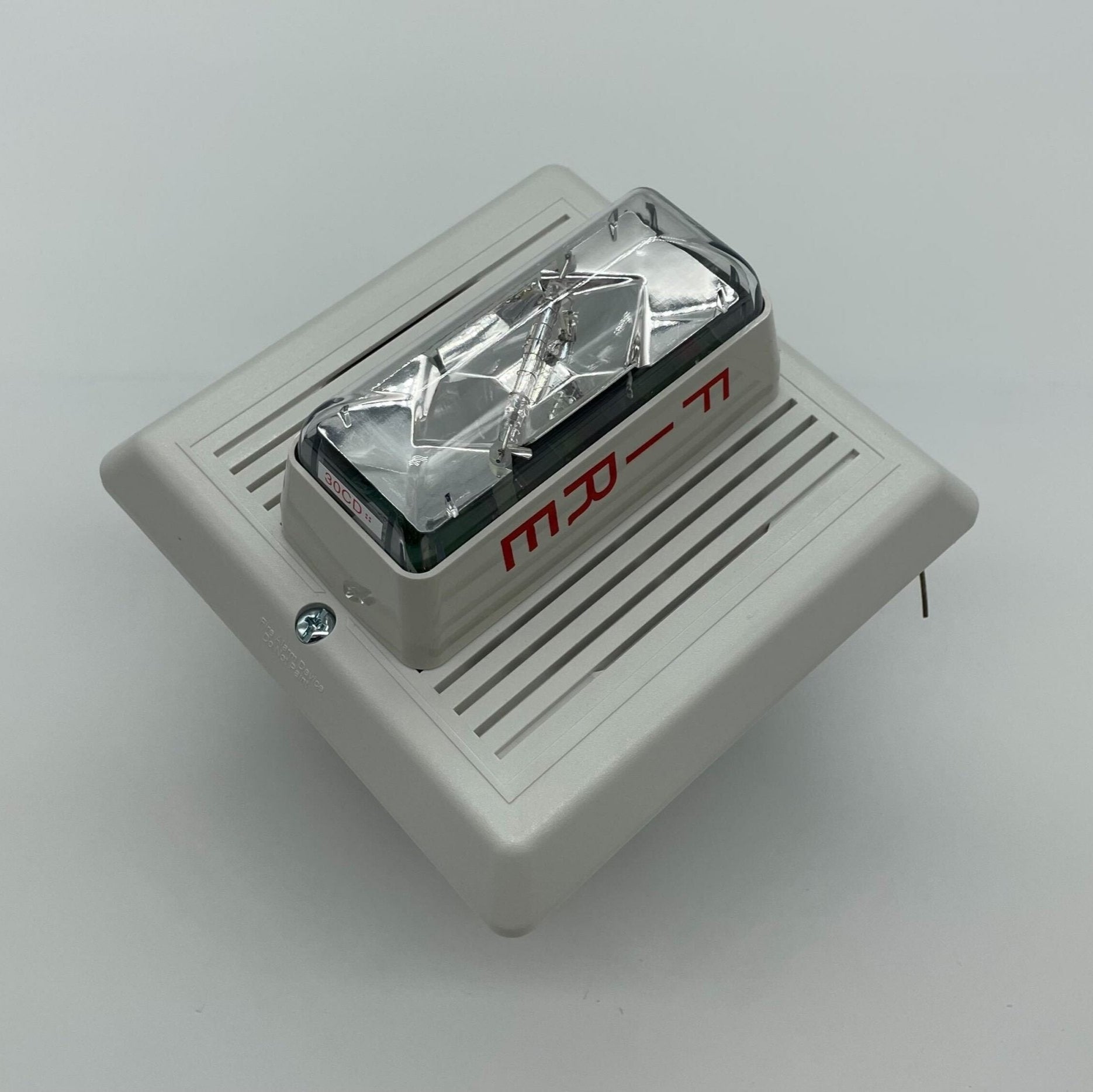 Edwards 757-3A-RS70W speaker strobe light with red lens, mounted on wall for emergency alert signaling.