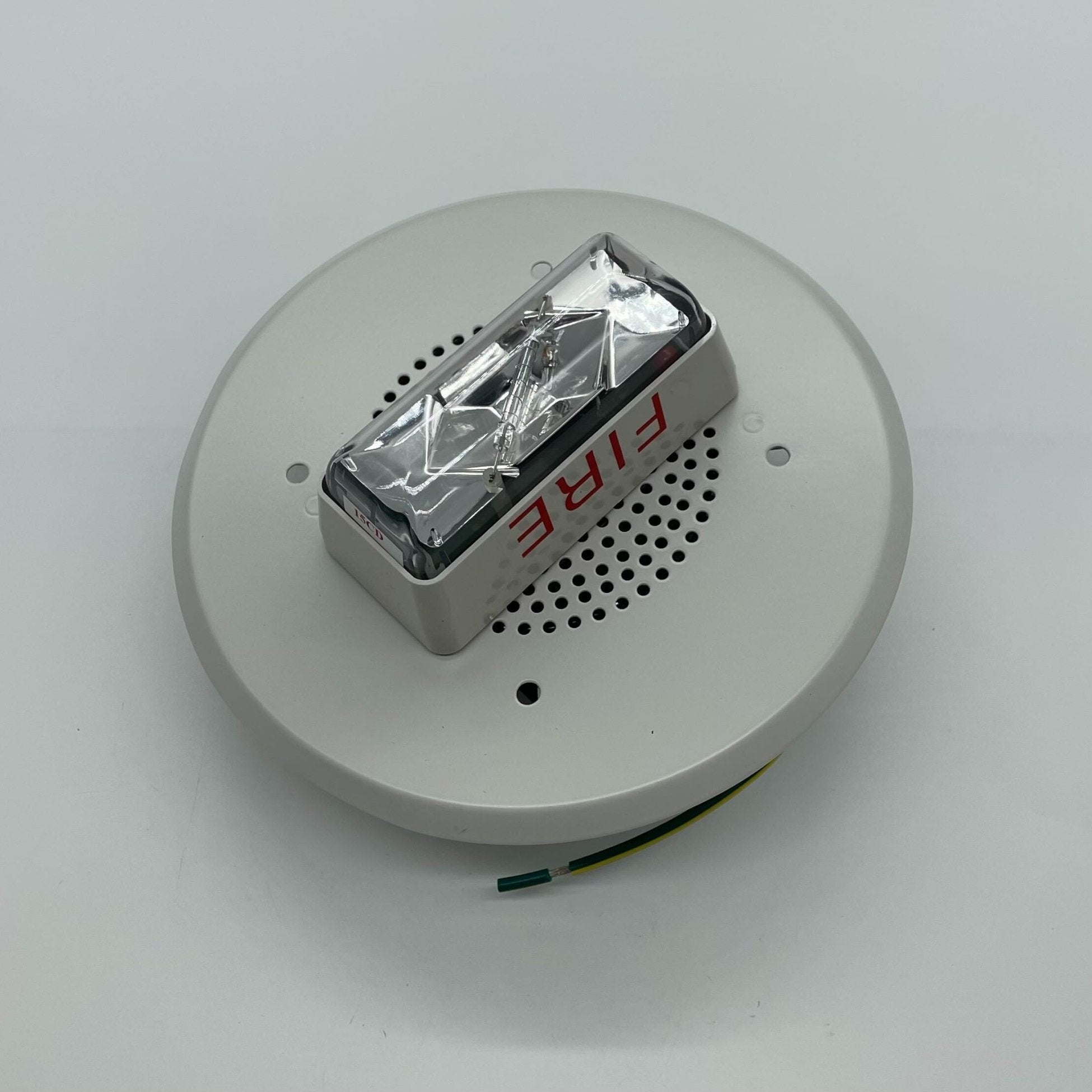 Edwards 965-5A-4RW speaker strobe alarm with red housing and clear lens, designed for fire safety alert systems.