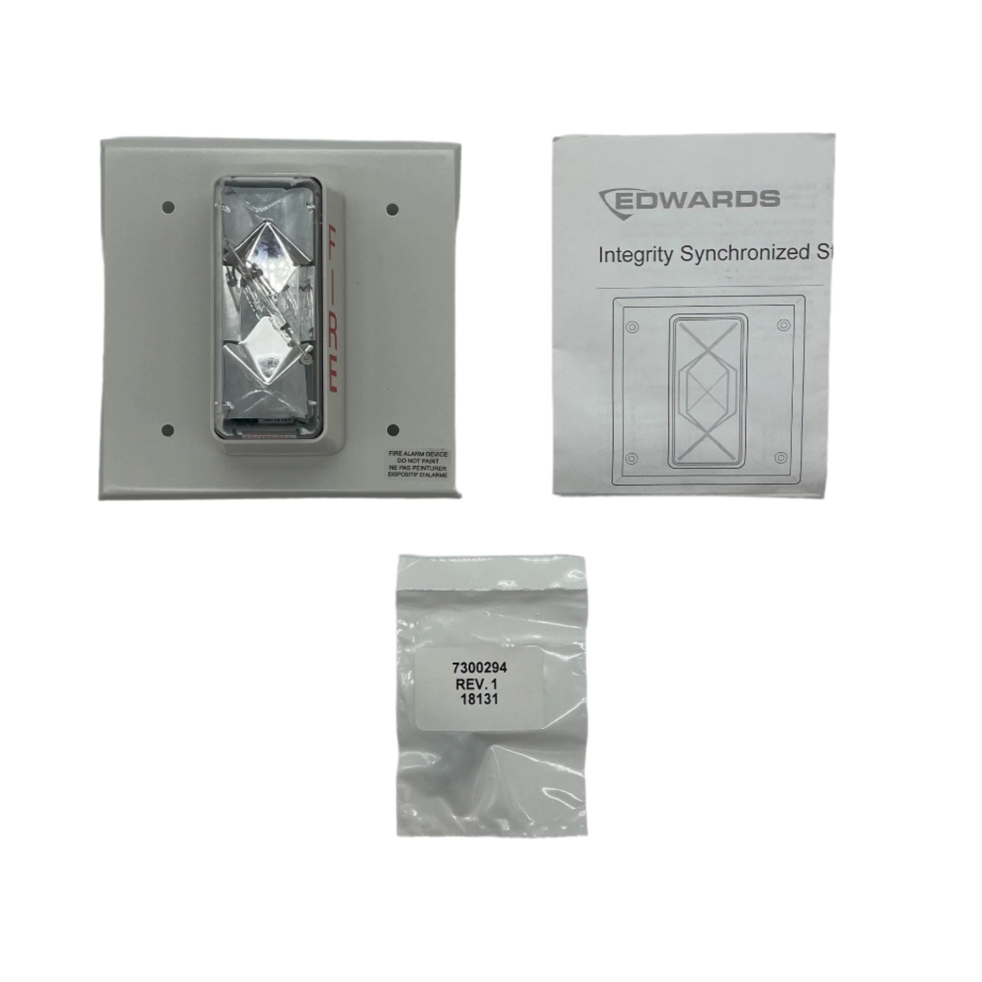 Edwards 405-7A-TW strobe light, mounted on a ceiling, with wiring visible, used for industrial or safety signaling.