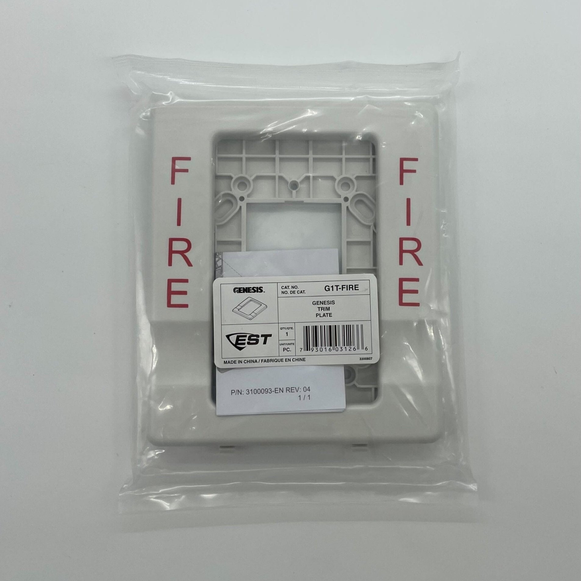 Edwards G1T-FIRE fire alarm with digital display and sensor, mounted on wall, designed for building safety.