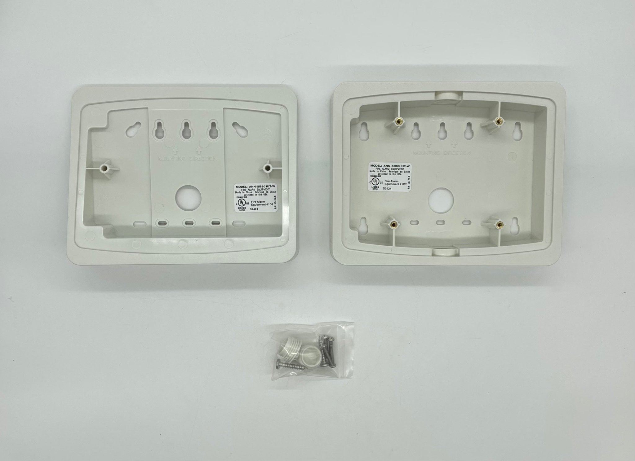 Firelite ANN-SB80KIT-W fire alarm system kit with smoke detectors and control panel, installed in a building.