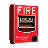 System Sensor ULC BG-12LRA fire alarm with test and reset buttons, mounted on a white ceiling.