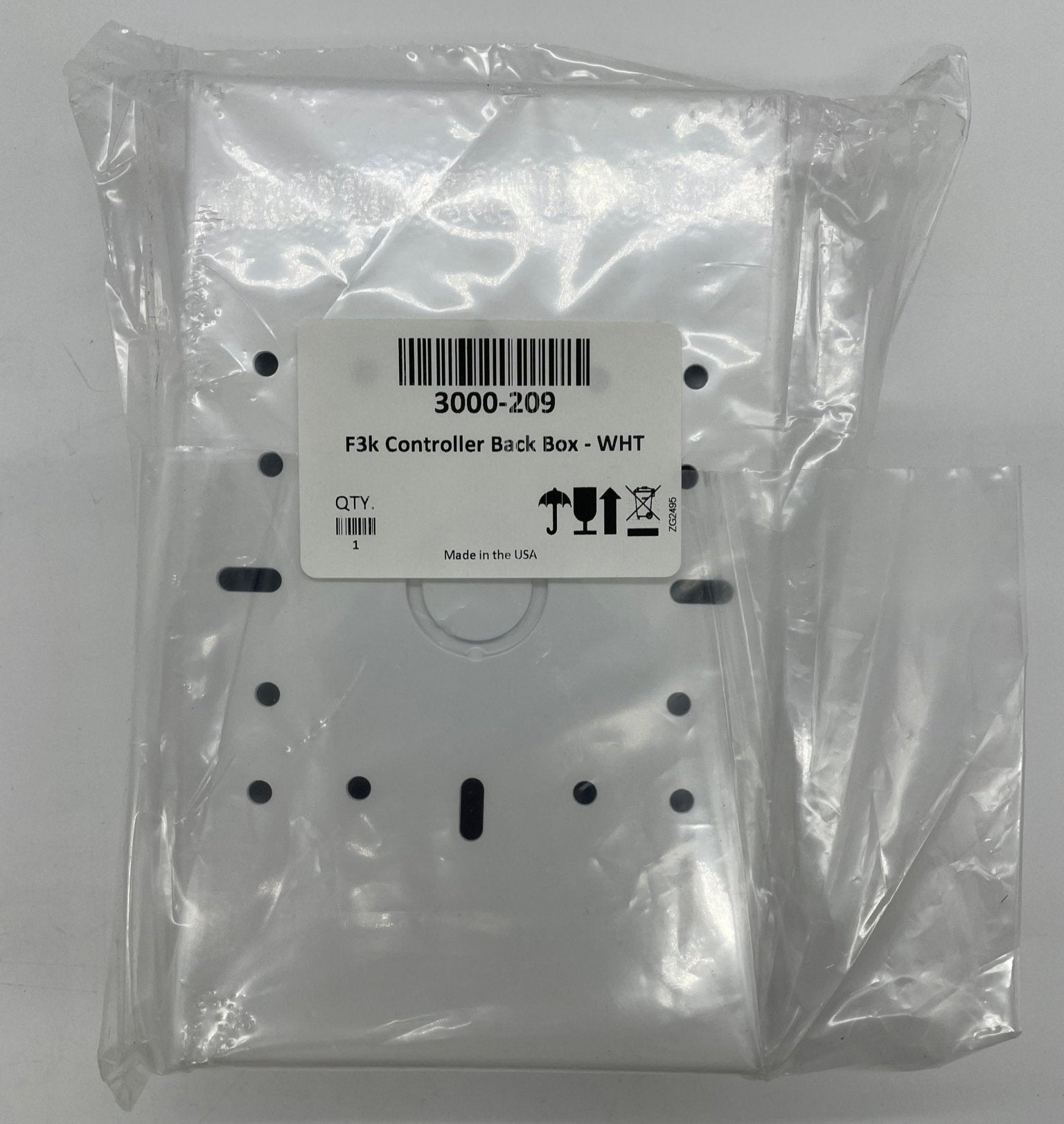 Fireray 3000-209 fire detection sensor by Fireray, mounted on ceiling in a commercial building for smoke detection.