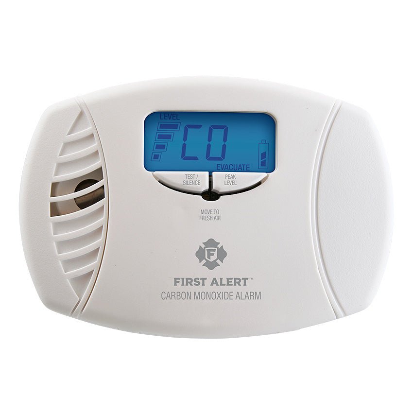 BRK CO615 fire alarm sensor with ULC certification, shown mounted on wall with wiring and mounting bracket.