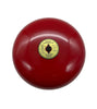 Gentex GB10-24 10-inch fire alarm bell mounted on wall, with metal housing and mounting bracket, used for emergency alert systems.