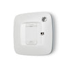 Gentex SCR smoke and carbon monoxide alarm detector with relay, 120VAC, mounted on wall, showing digital display and sensor.