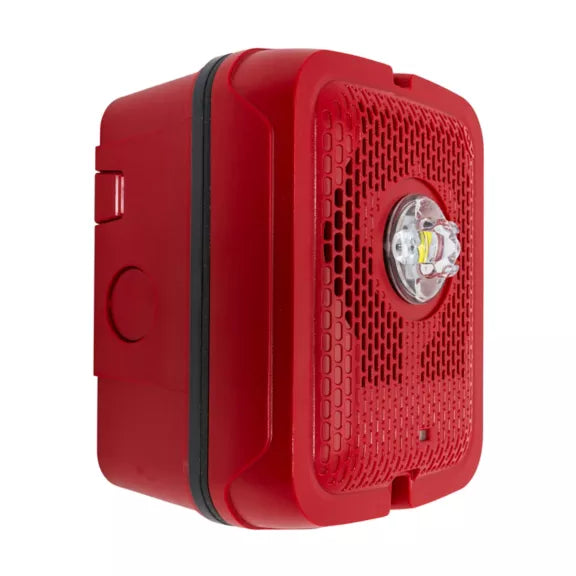 System Sensor SPSRKLED-P fire alarm with LED indicator, mounted on wall, designed for fire detection and safety.