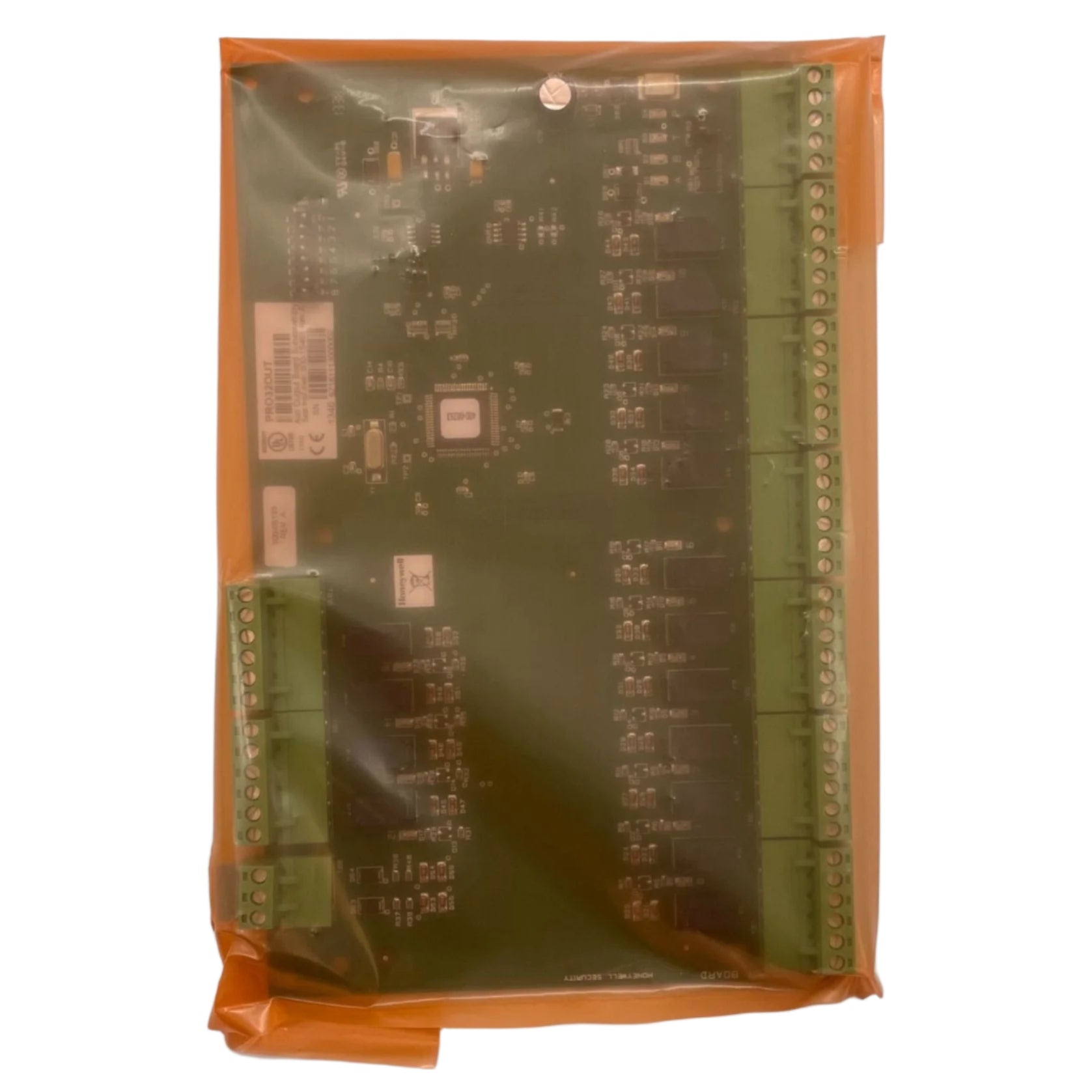Honeywell PRO32OUT commercial outdoor wireless alarm sensor mounted on a wall with visible wiring and mounting hardware.