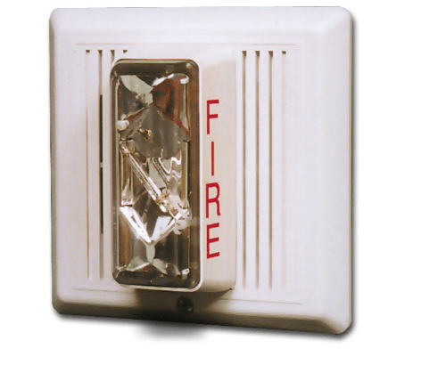 Edwards 2452THS-110-W fire alarm with digital display and sensor, mounted on a white wall in a commercial building.