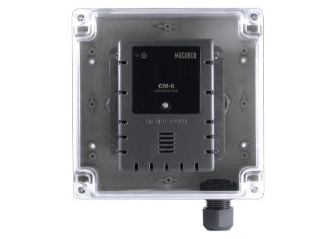 Macurco DMK-1 gas detector with digital display, mounted on wall for indoor air quality monitoring and safety.