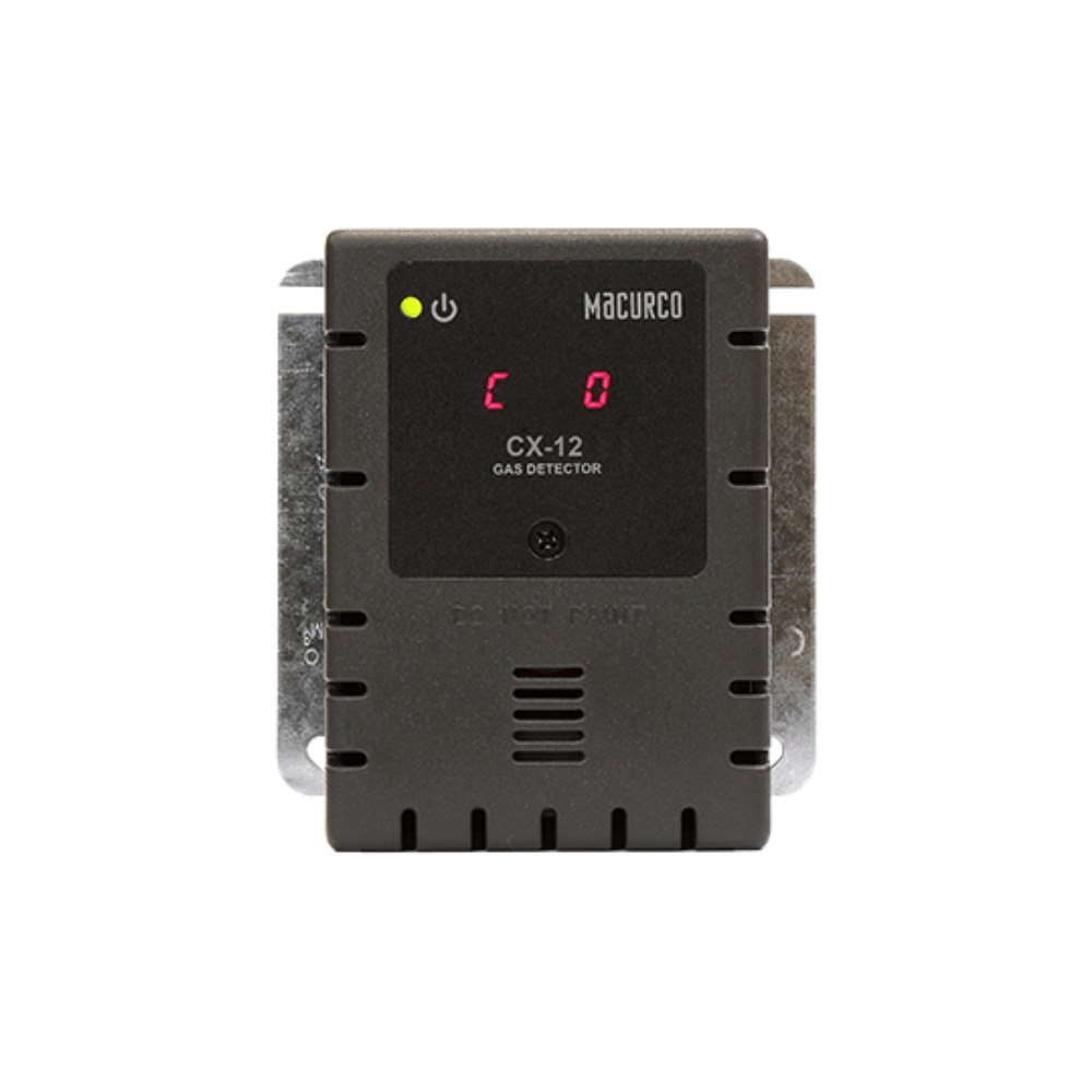 Macurco CX-12 fire alarm sensor with ULC certification, mounted on a wall in a safety system setup.