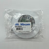 Mircom MSB-65B-4R fire alarm control panel with red and black buttons, mounted on a white wall for emergency system management.