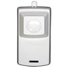 Napco PSIREN security alarm siren mounted on wall, black plastic housing with mounting bracket and warning labels.