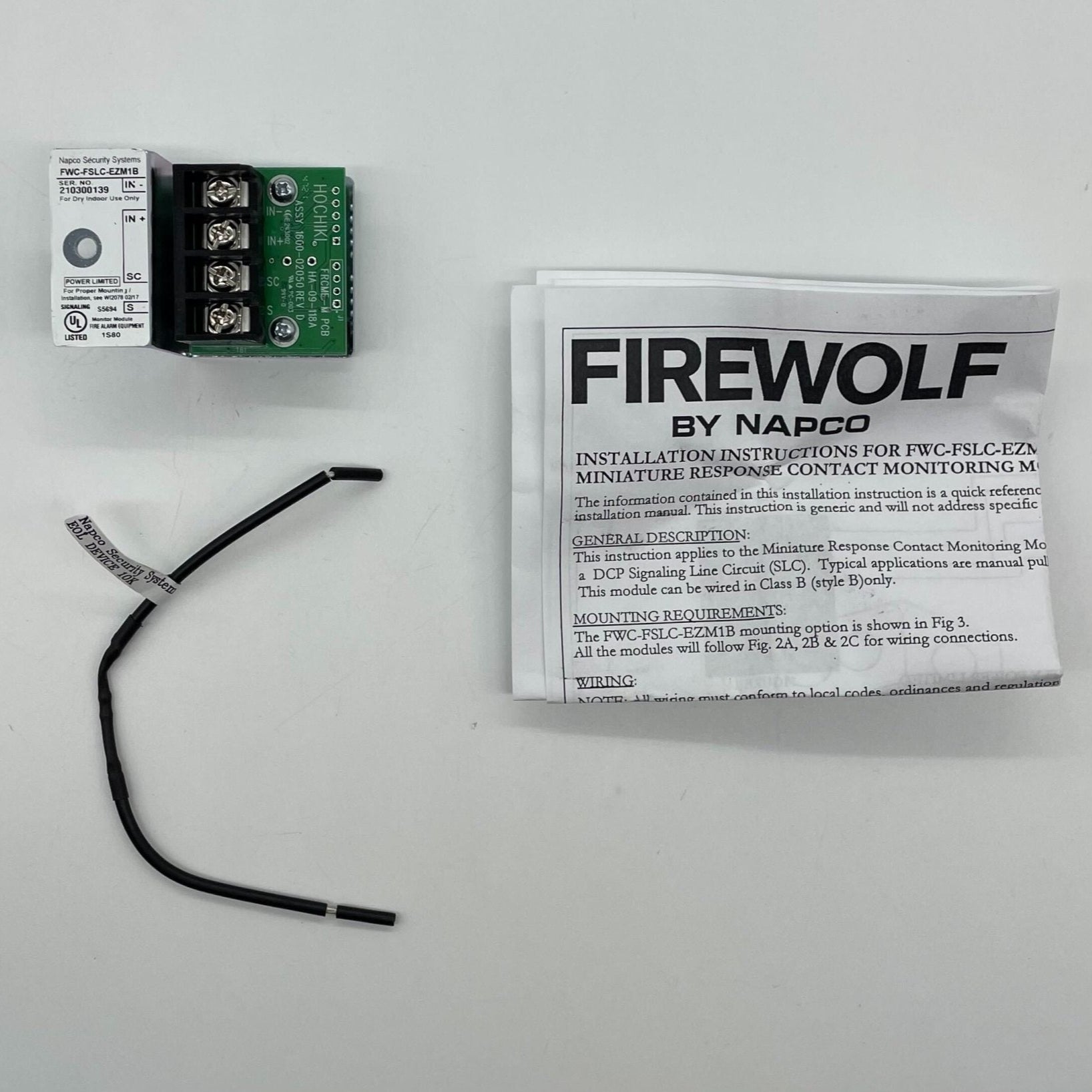 Napco FWC-FSLC-EZM1B smart security alarm system sensor with sleek design and visible sensor components.