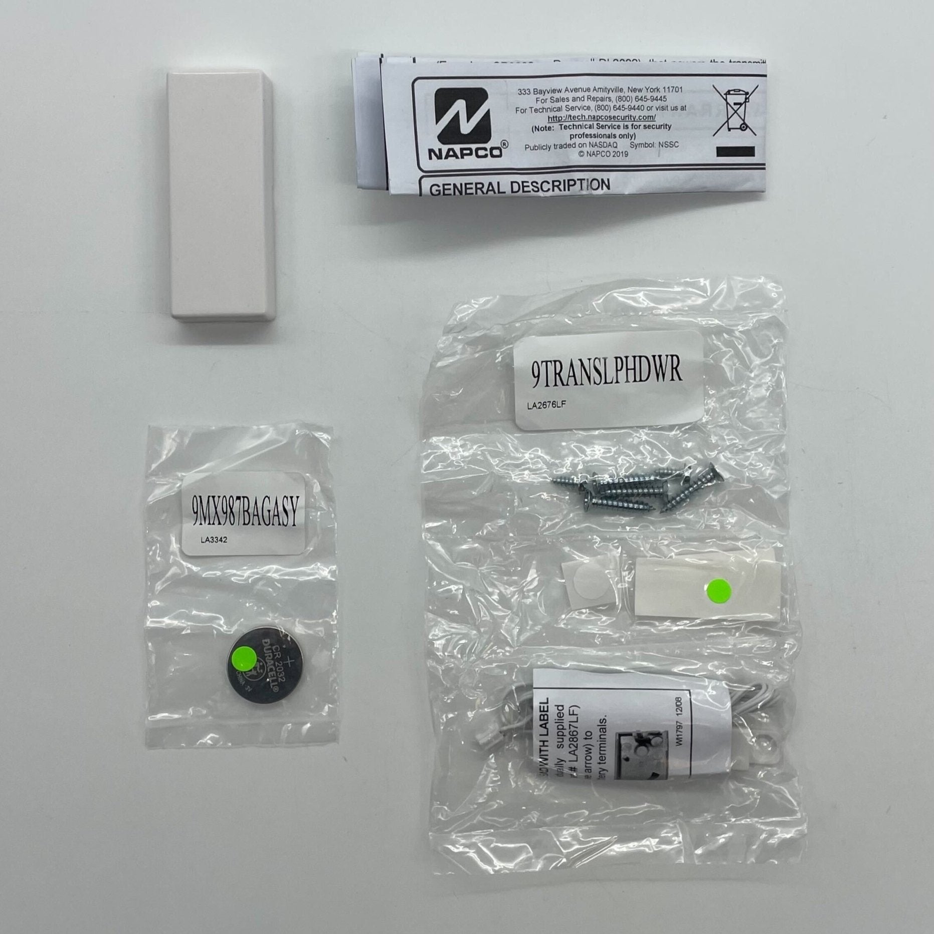 Napco GEM-TRANSLP fire alarm sensor with ULC certification, mounted on a wall for safety detection.