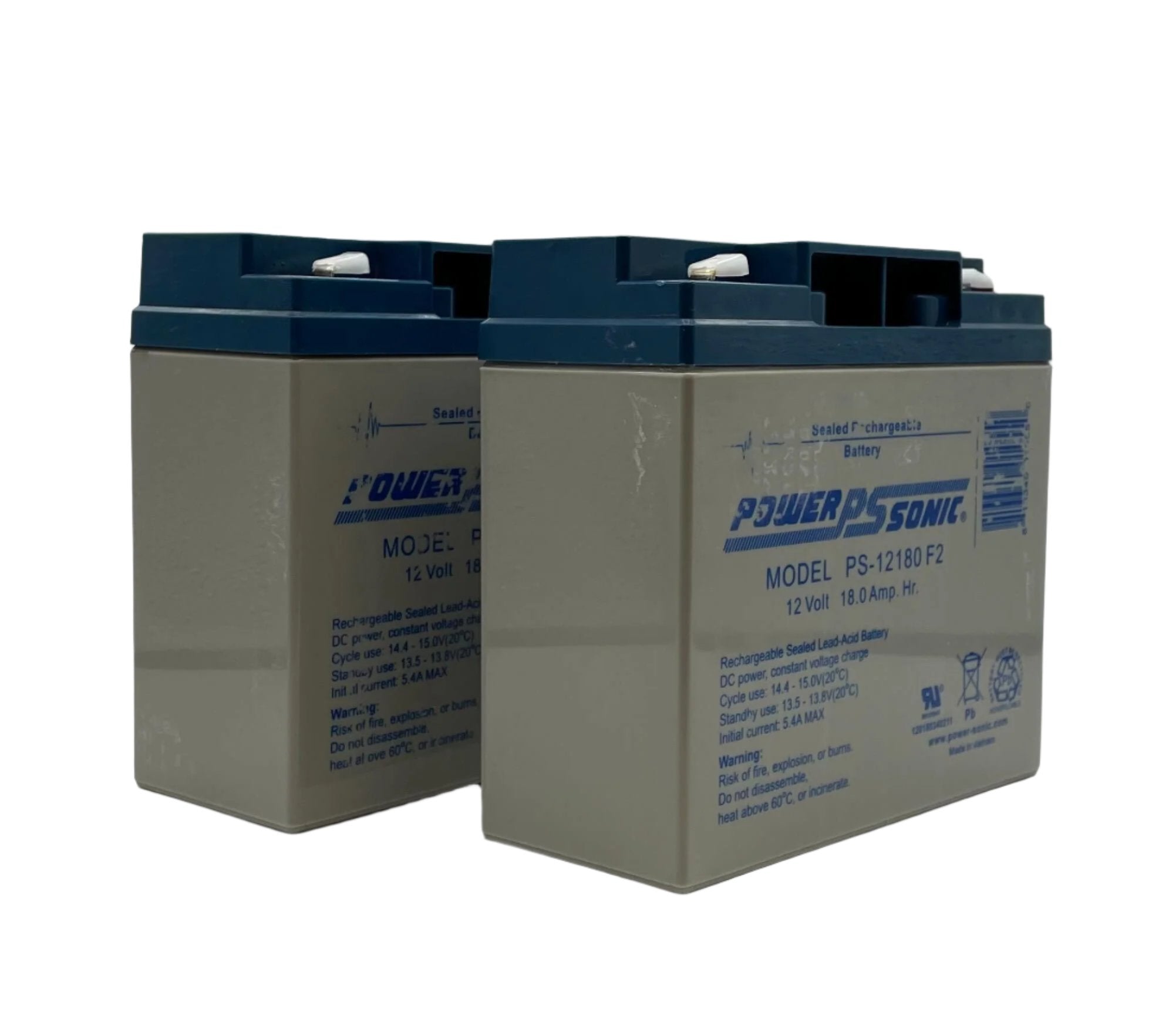 Fire-Lite BAT-12180-BP fire alarm battery showing terminals and label for emergency power backup system.
