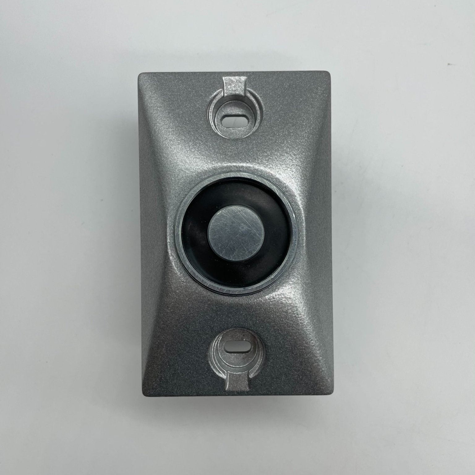 RSG DH1224SPC door holder mounted on a door, showcasing durable metal construction and professional installation.