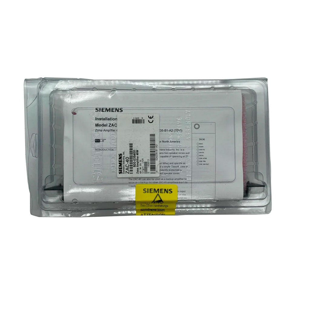 Siemens ZAC-40 fire alarm system mounted on wall, featuring digital display and control buttons for safety monitoring.