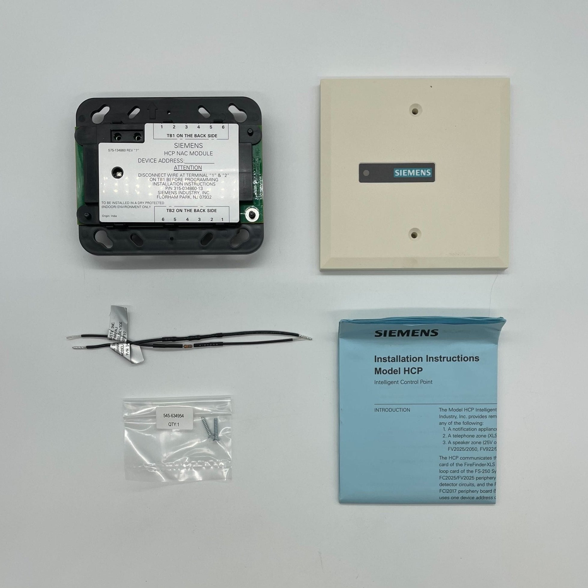 Siemens HCP fire alarm system from Siemens, showing the alarm unit with control buttons and indicator lights.