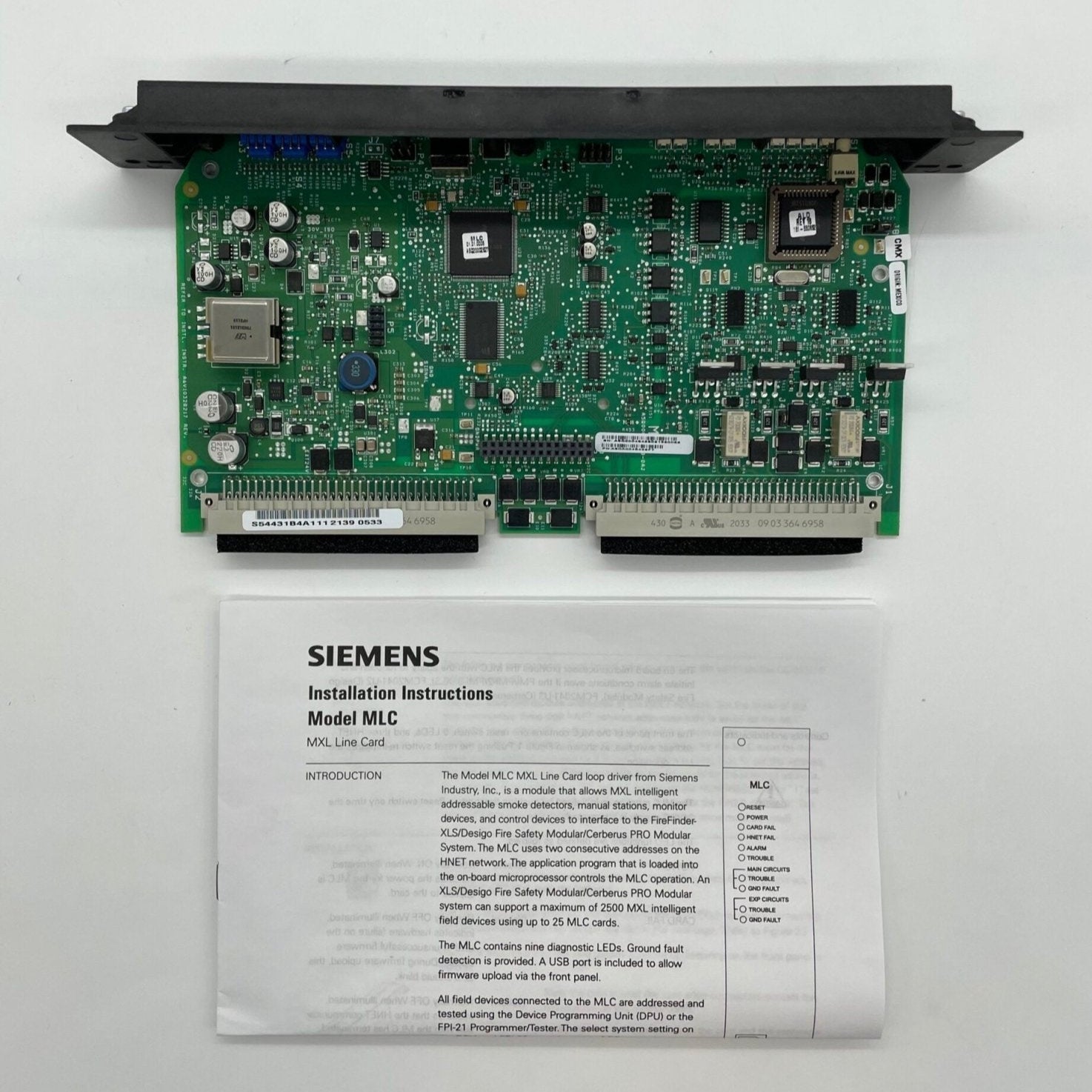 Siemens MLC fire alarm system with control panel and wiring, designed for reliable fire detection and safety.